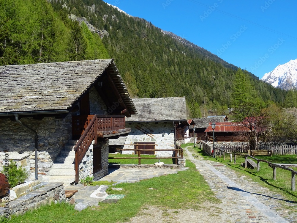 View of the town of Macugnaga, in the Italian alps, on a sunny day- April 2019