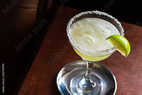 фотографія Chilled Margarita Cocktail Straight Up with Tequila, Lime, Triple Sec and a Salt