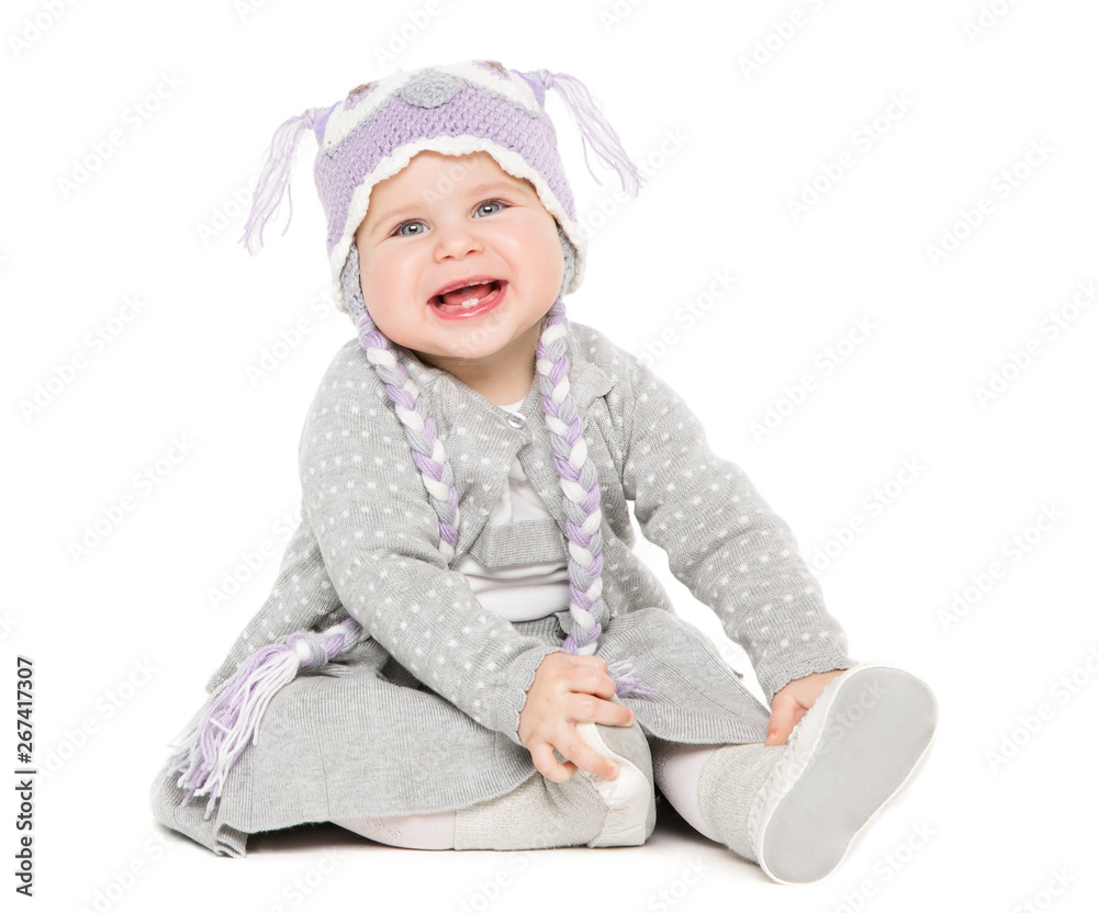 Baby Sitting on White Background, Happy Kid in Woolen Hat, Beautiful Girl Portrait One Year Old Baby Sitting on White Background, Happy Kid in Woolen Hat, Beautiful Girl Portrait One Year Old