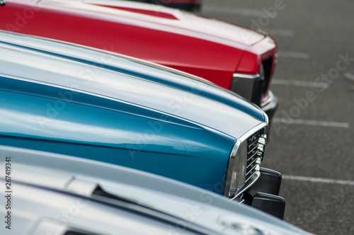 Mulhouse - France - 12 June 2019 - closeup of vintage cars alignment parked in the street