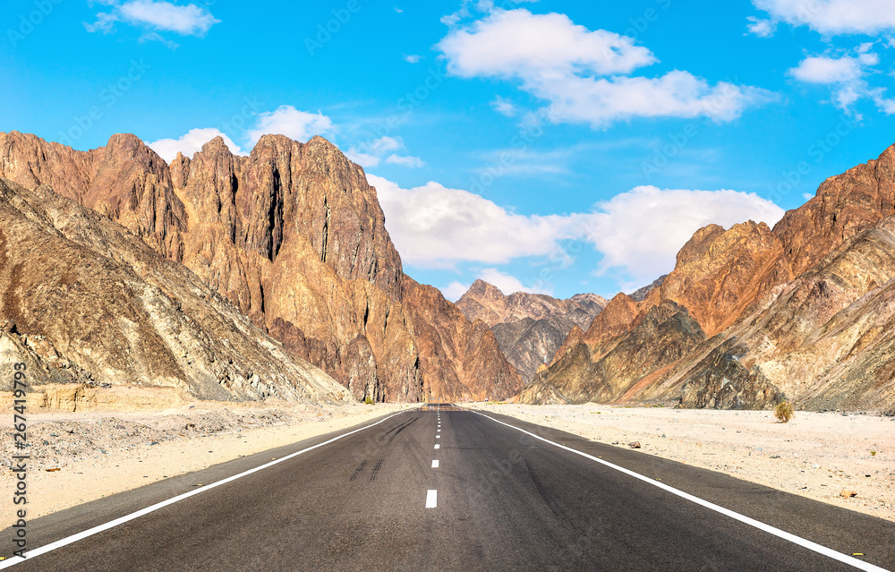Fototapeta premium Road and mountains in Egyptian desert
