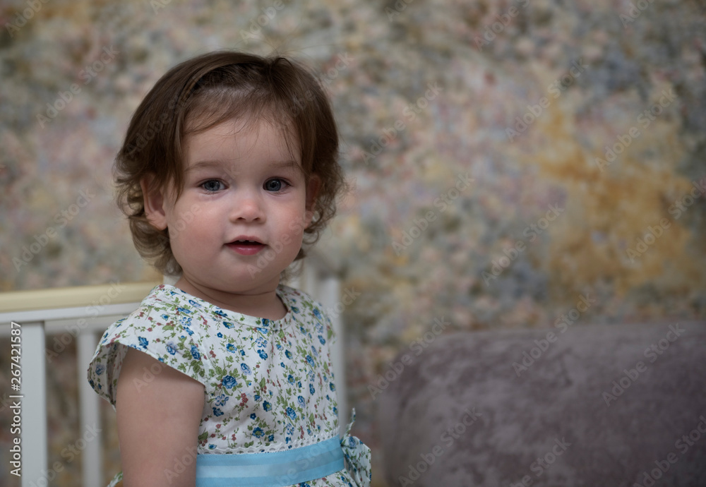 Portrait of a beautiful little girl in the room Portrait of a beautiful little girl in the room