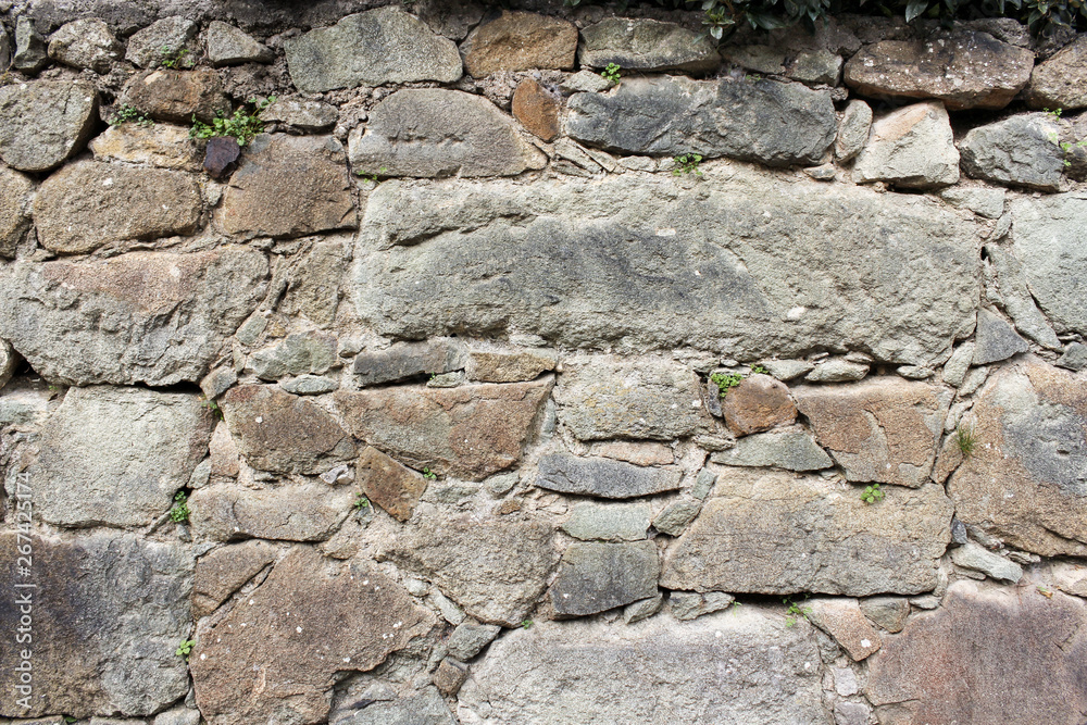 Background of the wall of natural stone. Background of the wall of natural stone.