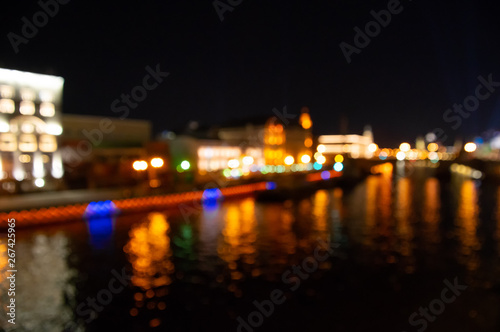 Abstract city lights background. Defocused urban background at night