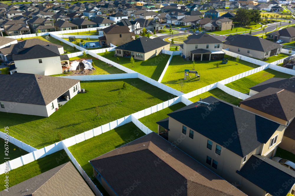 Camera drone flying over a neighborhood