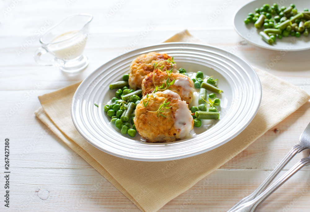 Fish cutlets with green peas and beans Fish cutlets with green peas and beans