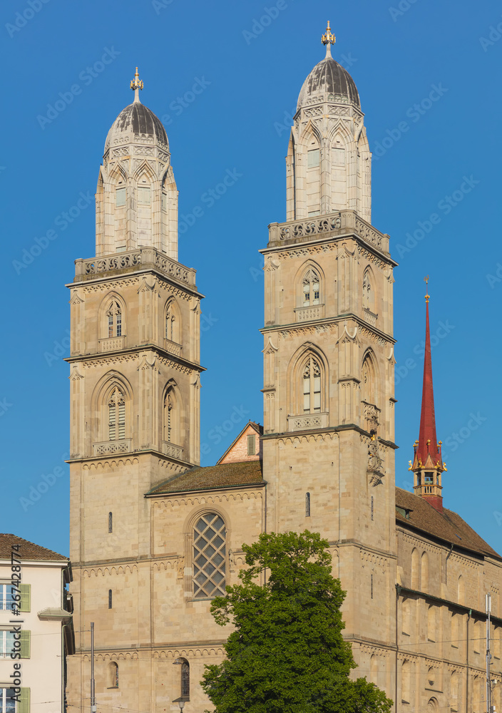 Towers of the Grossmunster cathedral in the city of Zurich, Switzerland. The twin towers of the Grossmunster are a well-known symbol of the city of Zurich.