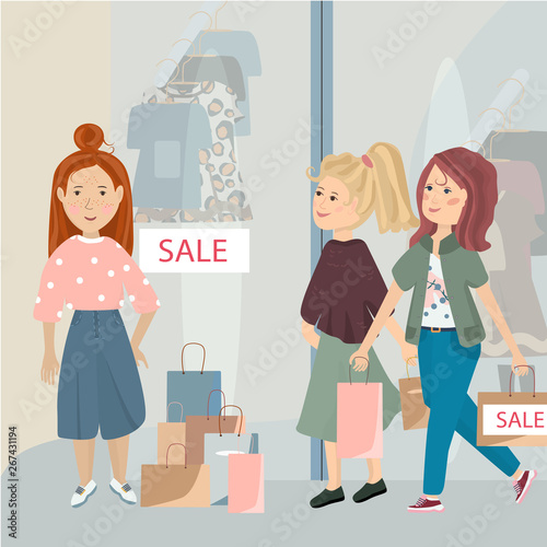 Several beautiful girl friends in a store on sale
