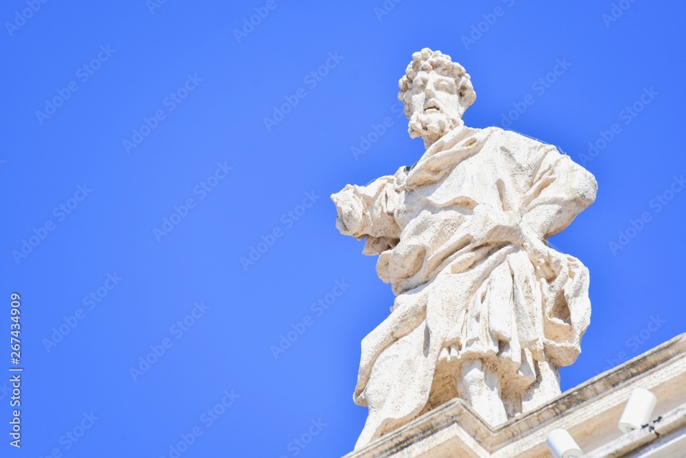 Ancient Saint Statue on Top of Bernini's Colonnade in Vatican City