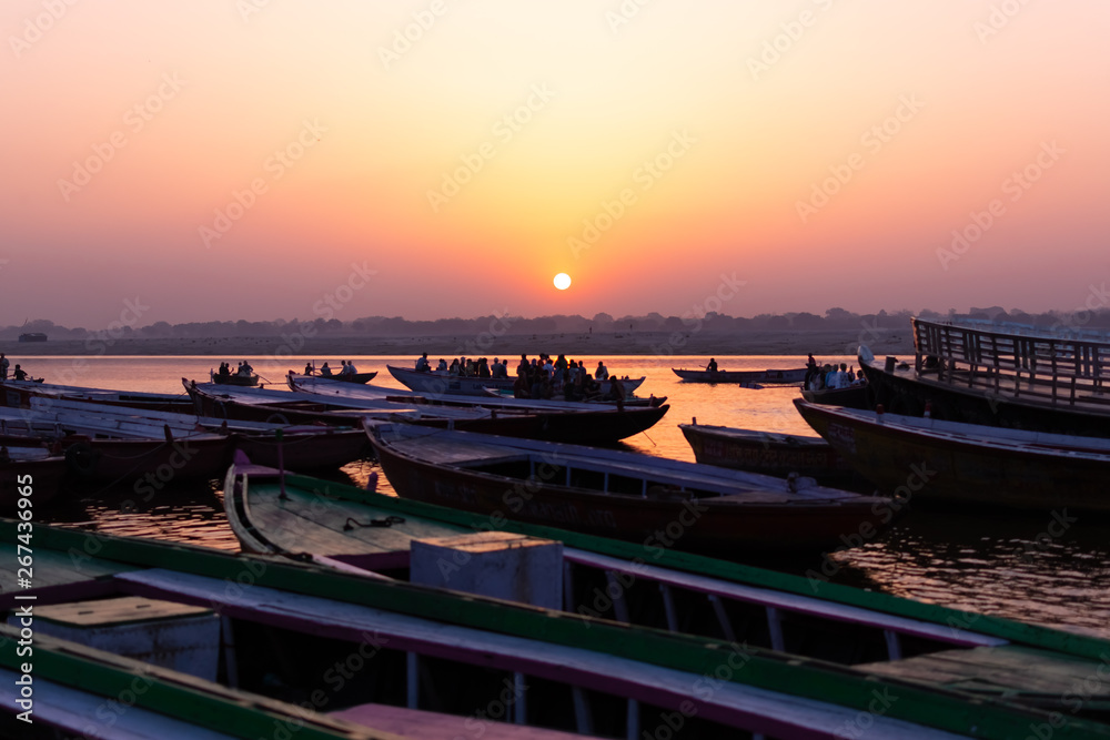 Sunrise at Ganga River with people ride a boats, Varanasi, India