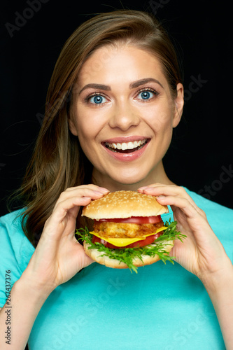 woman with burger and french fries