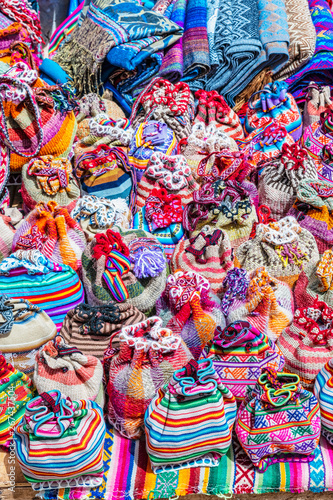 Textile products on sale in Chinchero street of Urubamba Province in Peru.