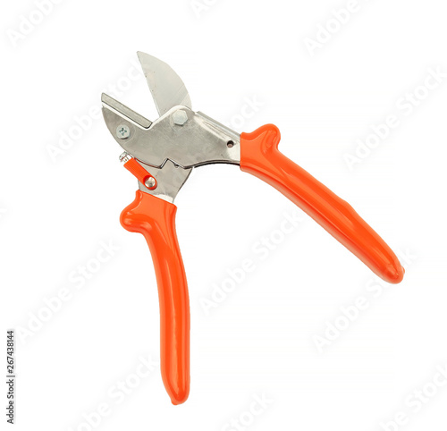 Red pruning shears, garden secateurs or hand pruners are garden tools used in gardening for cutting tree branches and landscaping gardens, isolated on white background with a clipping path cutout.