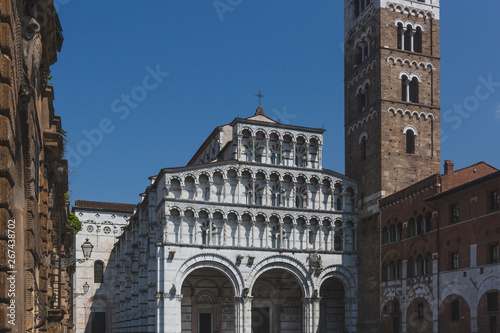 Front facade of St Martin Cathedral and tower, in Lucca, Tuscany, Italy