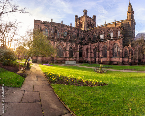 The sandstone exterior (from the south west) has much decorative architectural detail but is heavily restored of Chester Cathedral in Chester, UK.