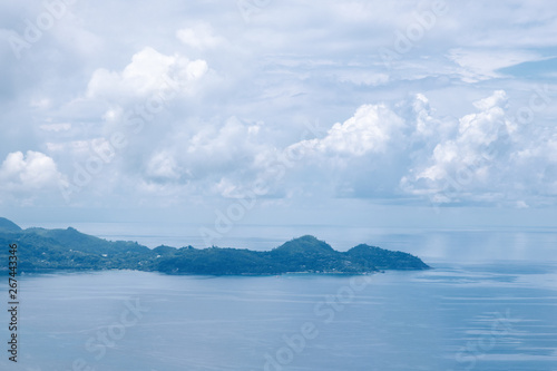 Beautiful view of the Indian Ocean and blue sky with cloud from the island of Mae, Seychelles.