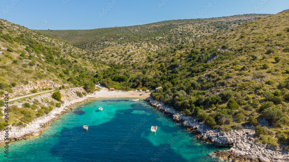 Obraz premium Spectacular aerial sea landscape of rocky coast and crystal clear water.