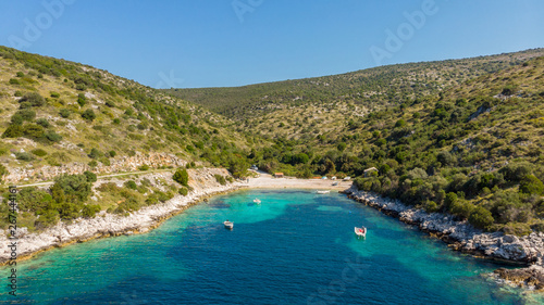 Spectacular aerial sea landscape of rocky coast and crystal clear water.