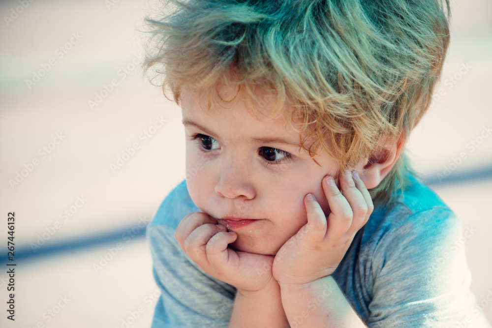 Cute boy thought. Beautiful child portrait. Blonde boy after food. Cute boy thought. Beautiful child portrait. Blonde boy after food.