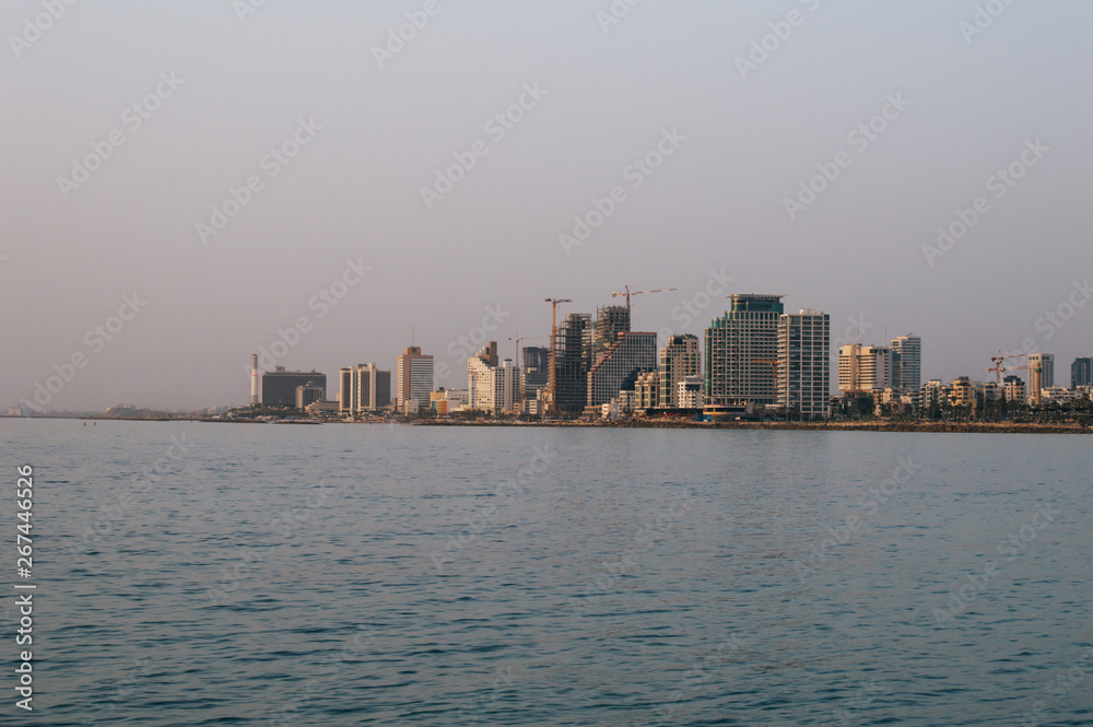 View in the evening of the modern Tel Aviv, Israel and the sea