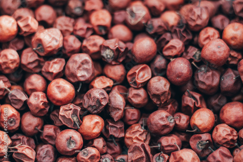 Close Up of Red dried jujube. Ziziphus mauritiana, also known as Chinese date, ber, Chinee apple, jujube, Indian plum, Regi pandu, Indian jujube, dunks (in Barbados) and masau photo