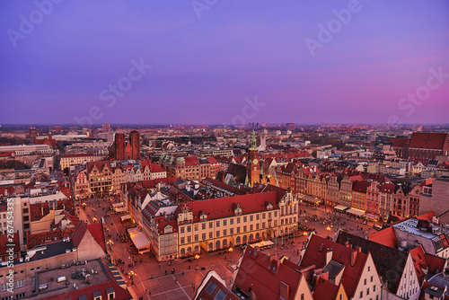 Obraz na płótnie Aerial view of the sunset of Stare Miasto with Market Square, Old Town Hall and St. Elizabeth's Church from St. Mary Magdalene Church in Wroclaw, Poland w salonie