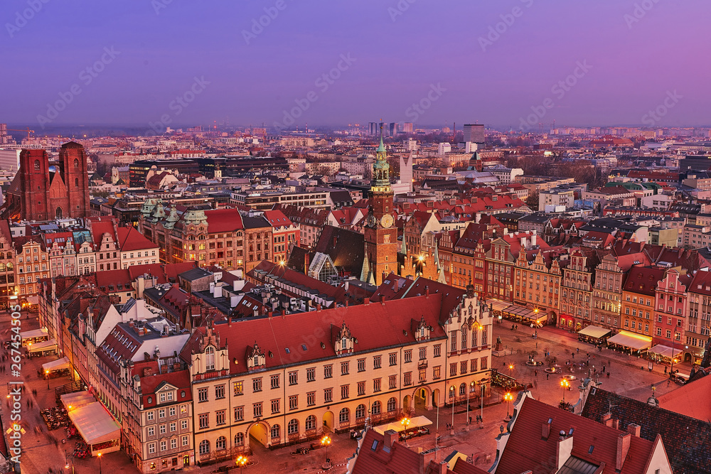 Aerial view of the sunset of Stare Miasto with Market Square, Old Town Hall and St. Elizabeth's Church from St. Mary Magdalene Church in Wroclaw, Poland