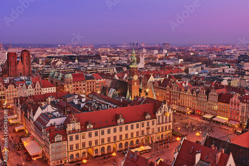 Obraz na płótnie Aerial view of the sunset of Stare Miasto with Market Square, Old Town Hall and St. Elizabeth's Church from St. Mary Magdalene Church in Wroclaw, Poland w salonie