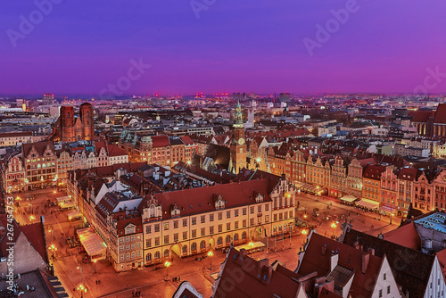 Obraz na płótnie Aerial view of the sunset of Stare Miasto with Market Square, Old Town Hall and St. Elizabeth's Church from St. Mary Magdalene Church in Wroclaw, Poland w salonie