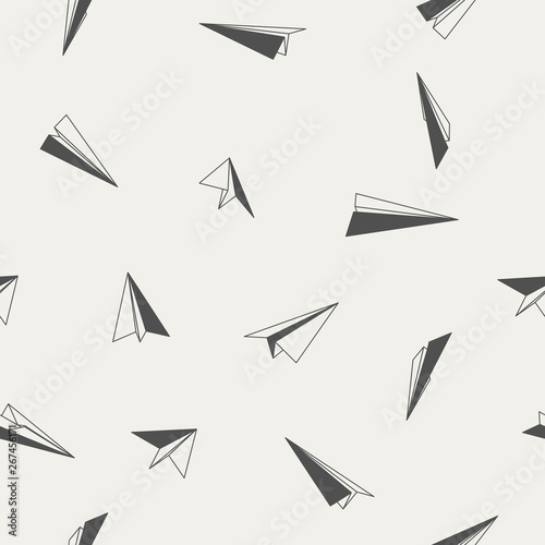 Paper planes seamless pattern. Black and white planes flying in the sky. Background with different views of paper planes.