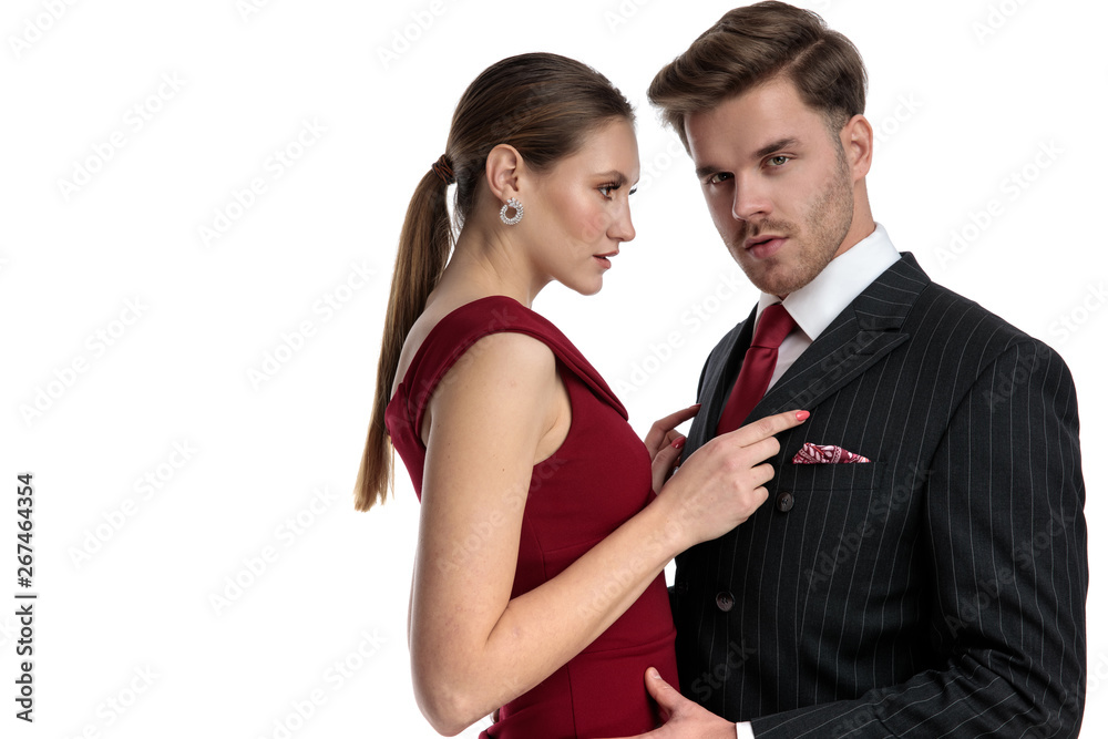 Confident amorous couple embraceing each other