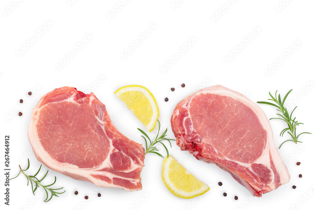 sliced raw pork meat with rosemary and lemon isolated on white background with copy space for your text. Top view. Flat lay sliced raw pork meat with rosemary and lemon isolated on white background with copy space for your text. Top view. Flat lay