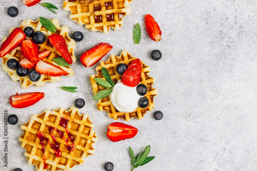 Traditional belgian waffles with fresh berries