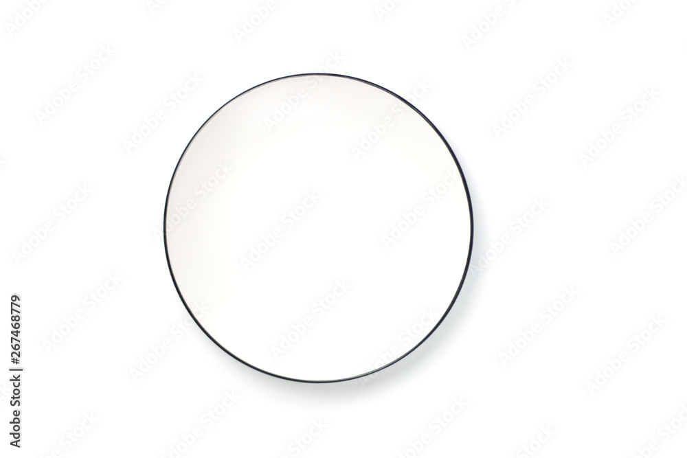Empty white round plate with black border. Copy space. Top view. Isolated Empty white round plate with black border. Copy space. Top view. Isolated