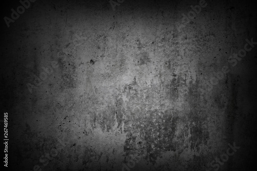 Grey dark textured grunge concrete wall background © Stillfx