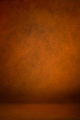 Background studio portrait backdrops brown canvas traditional painted background on the wall and on the floor with a soft transition.