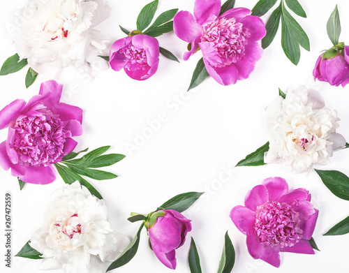 Fototapeta Naklejka Na Ścianę i Meble -  Floral frame made of pink and white peony flowers and leaves isolated on white background. Flat lay. Top view.