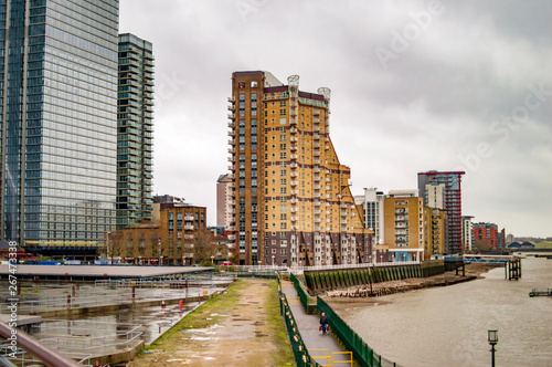 Canary wharf with thames in london with tall buildings on the banks © ProMicroStockRAW
