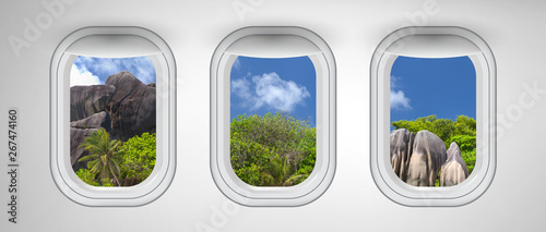 Seychelles rocks as seen through three aircraft windows. Holiday and travel concept