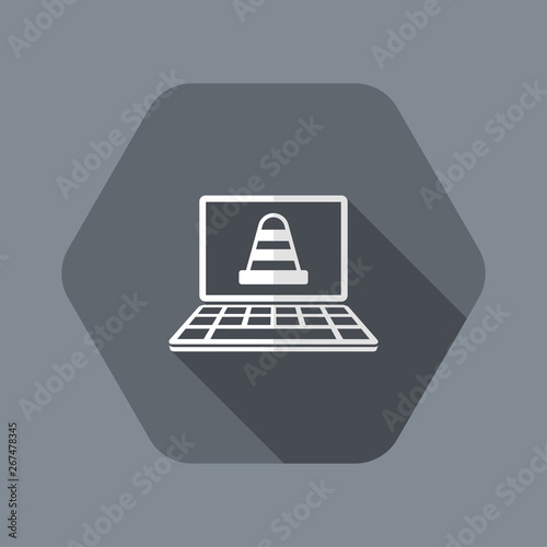 Road cone on computer laptop