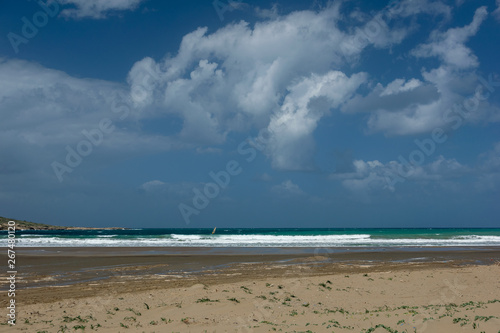 Waves On sand beach of the Aegean Sea in Rhodes.