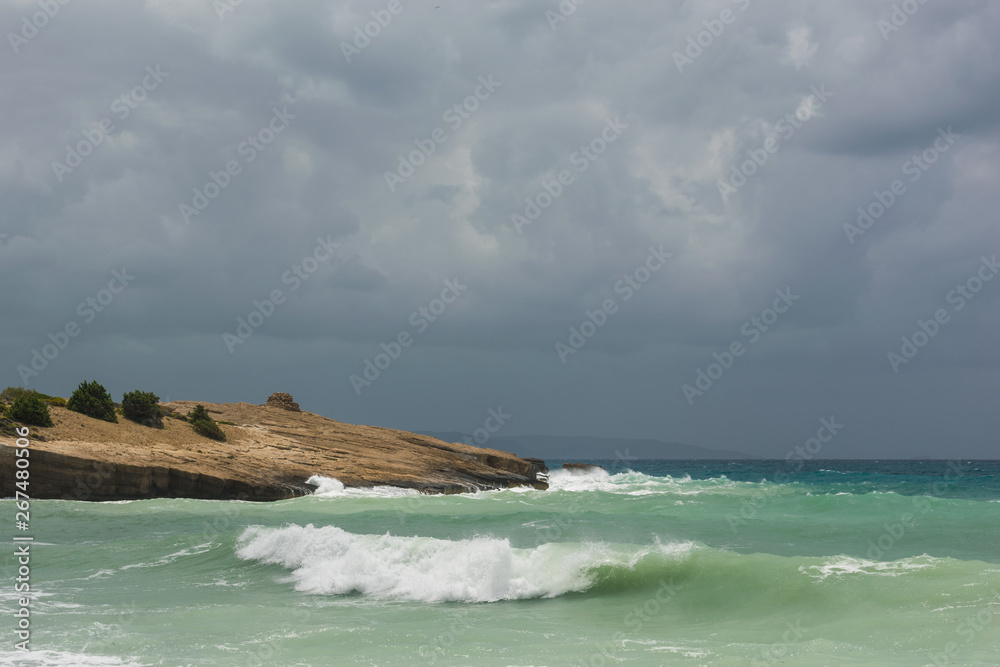 Waves in a bay of the Aegean Sea in Rhodes. Waves in a bay of the Aegean Sea in Rhodes.