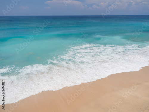 beach with waves in island of Bali 