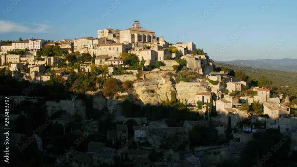 View of Gordes, labelled Most Beautiful Villages of France, perched on a rocky outcrop at the end of the Vaucluse plateau. View of Gordes, labelled Most Beautiful Villages of France, perched on a rocky outcrop at the end of the Vaucluse plateau.