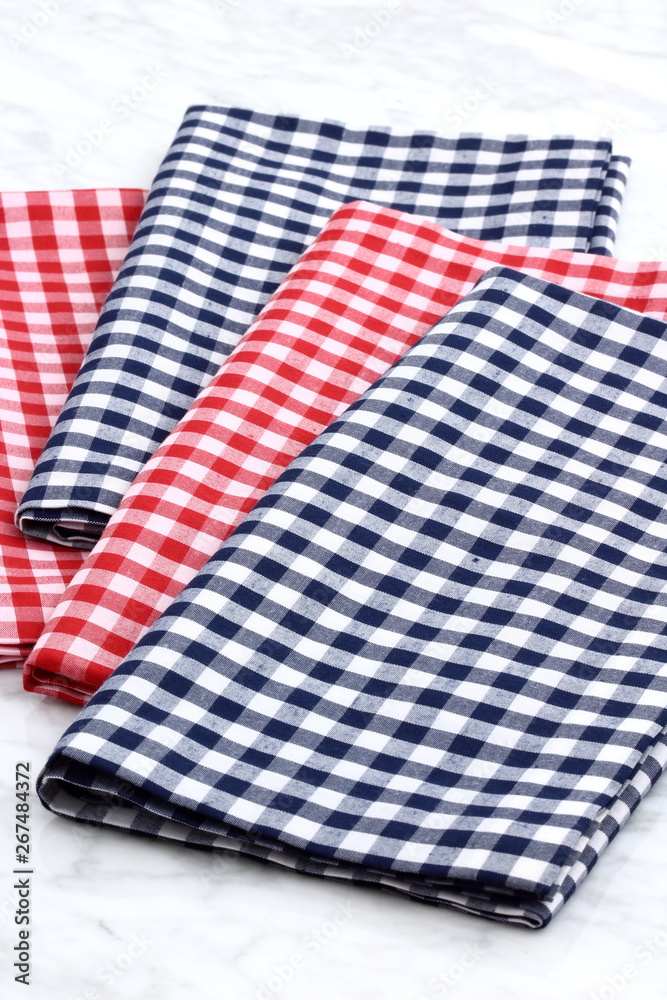 set of fabric napkins on marble countertop set of fabric napkins on marble countertop