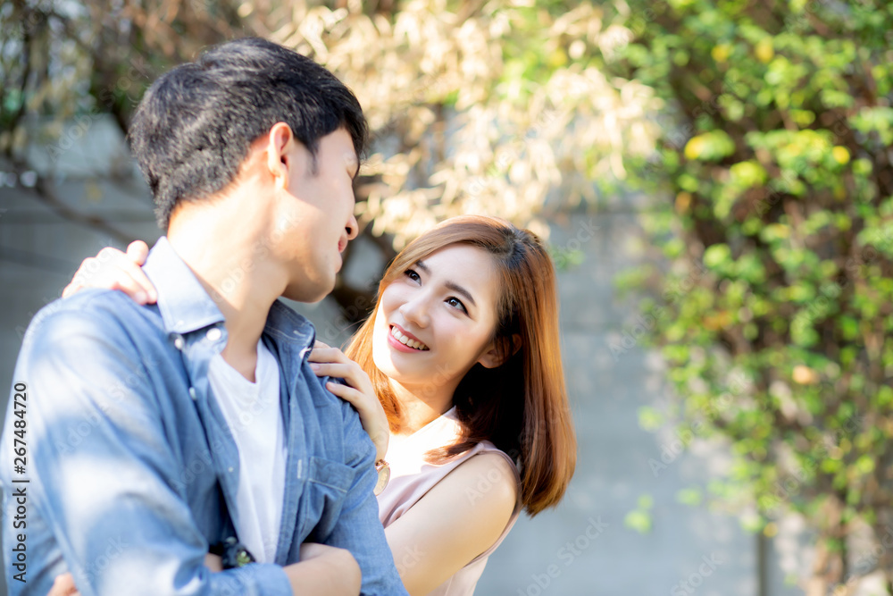 Beautiful portrait couple looking each others eyes and smiling with happy, young asian man and woman relation with love dating, husband and wife feeling and emotion, lovers and lifestyle concept. Beautiful portrait couple looking each others eyes and smiling with happy, young asian man and woman relation with love dating, husband and wife feeling and emotion, lovers and lifestyle concept.