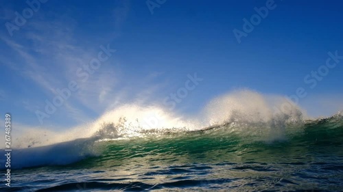 soft wave crumbling over camera in textured offshore santa ana winds to interesting underwater bubbles afterwords.  5x slow motion photo