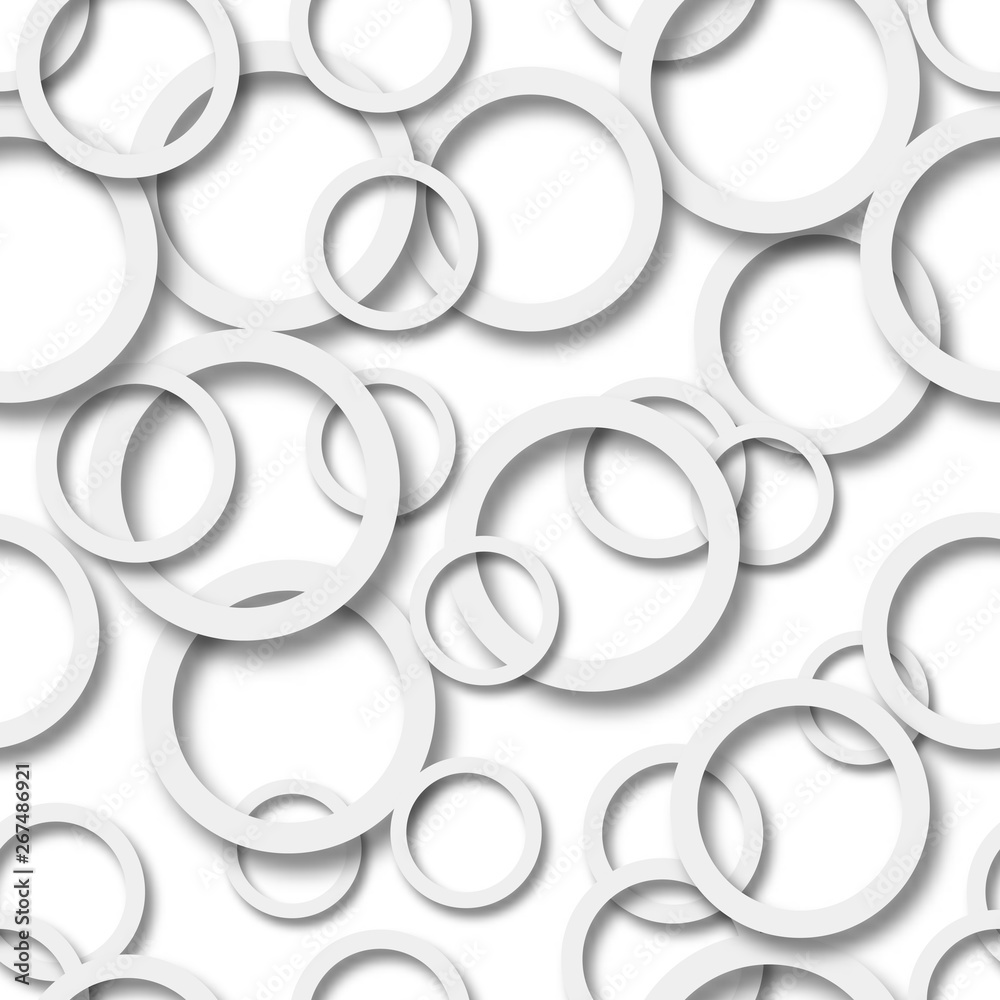 Abstract seamless pattern of randomly arranged gray rings with soft shadows on white background Abstract seamless pattern of randomly arranged gray rings with soft shadows on white background