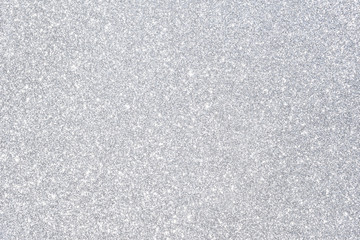 sparkles of silver glitter abstract background