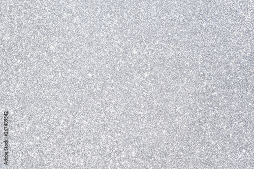 sparkles of silver glitter abstract background